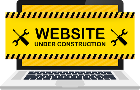 Website Under construction sign on laptop